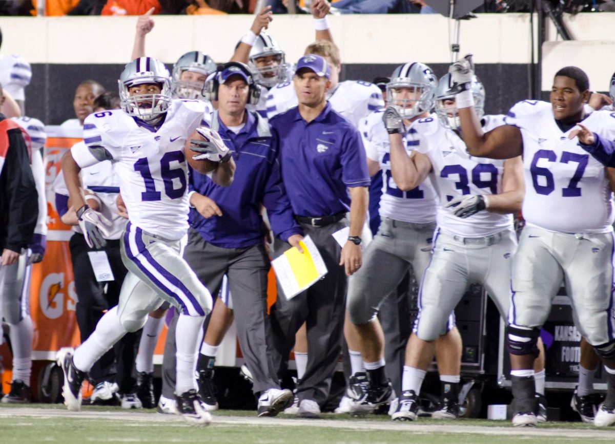 Wide receiver Tyler Lockett breaks free from the pack up the sideline for a 57-yard run at Boone Pickens Stadium on Nov. 5, 2011 in Stillwater, Okla. No. 14 Kansas State ended the game with 276 yards rushing while No. 3 OSU ended with only 73, but the Wildcats fell 52-45 (Archive photo by Tommy Thesis | COLLEGIAN MEDIA GROUP).