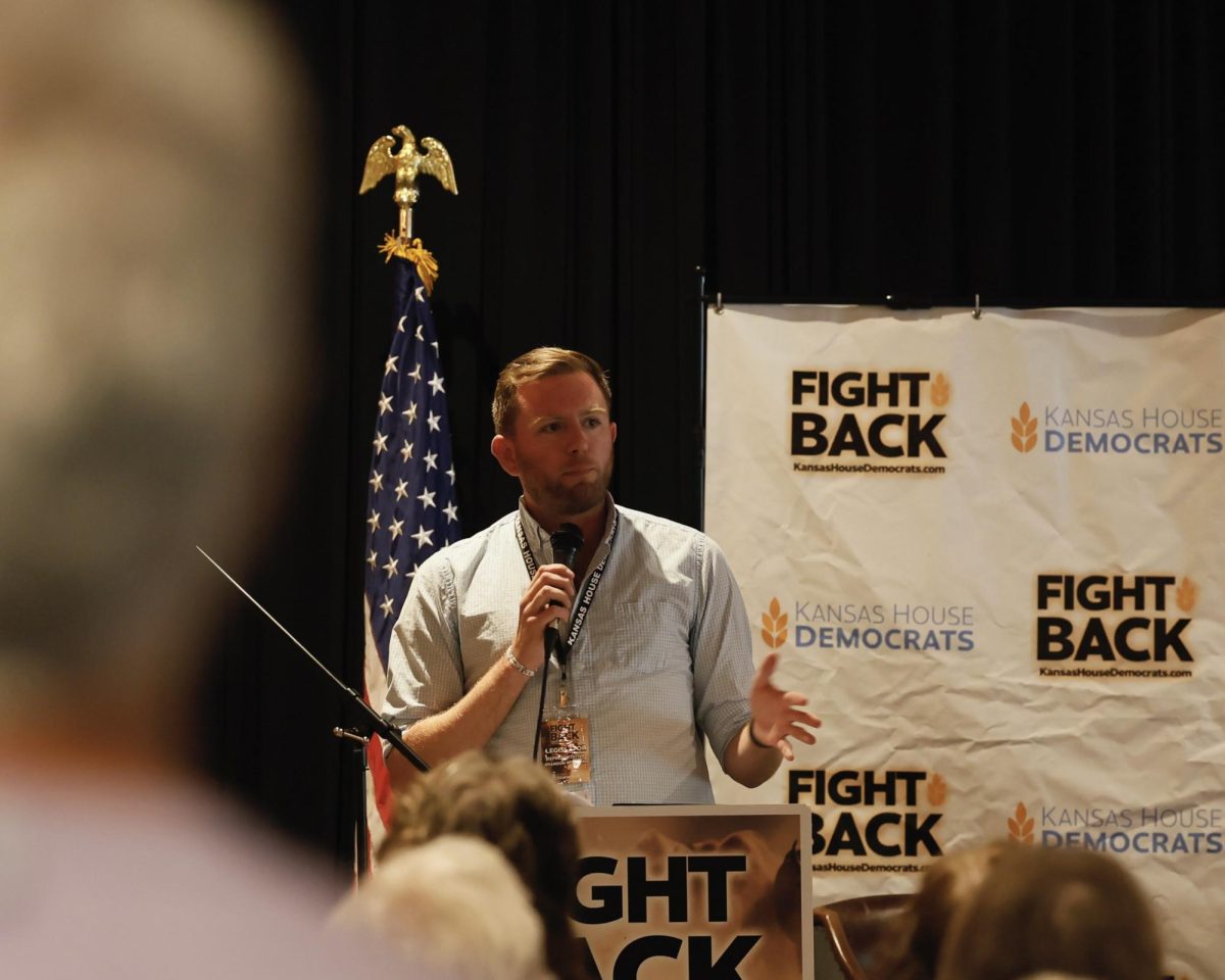 Representative Brandon Woodard speaks at Kansas House Democrats Fight Back tour event in Manhattan, Kansas on August 27.