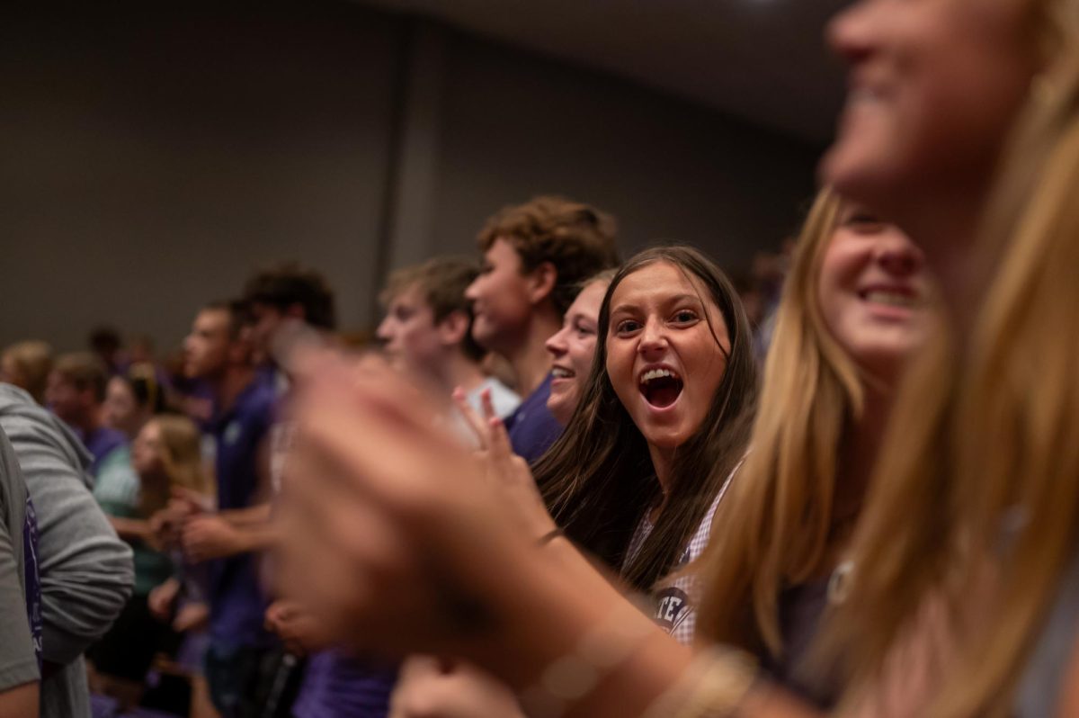 Students celebrate a K-State touchdown at watch party hosted in the K-State Student Union on Saturday, August 23. 