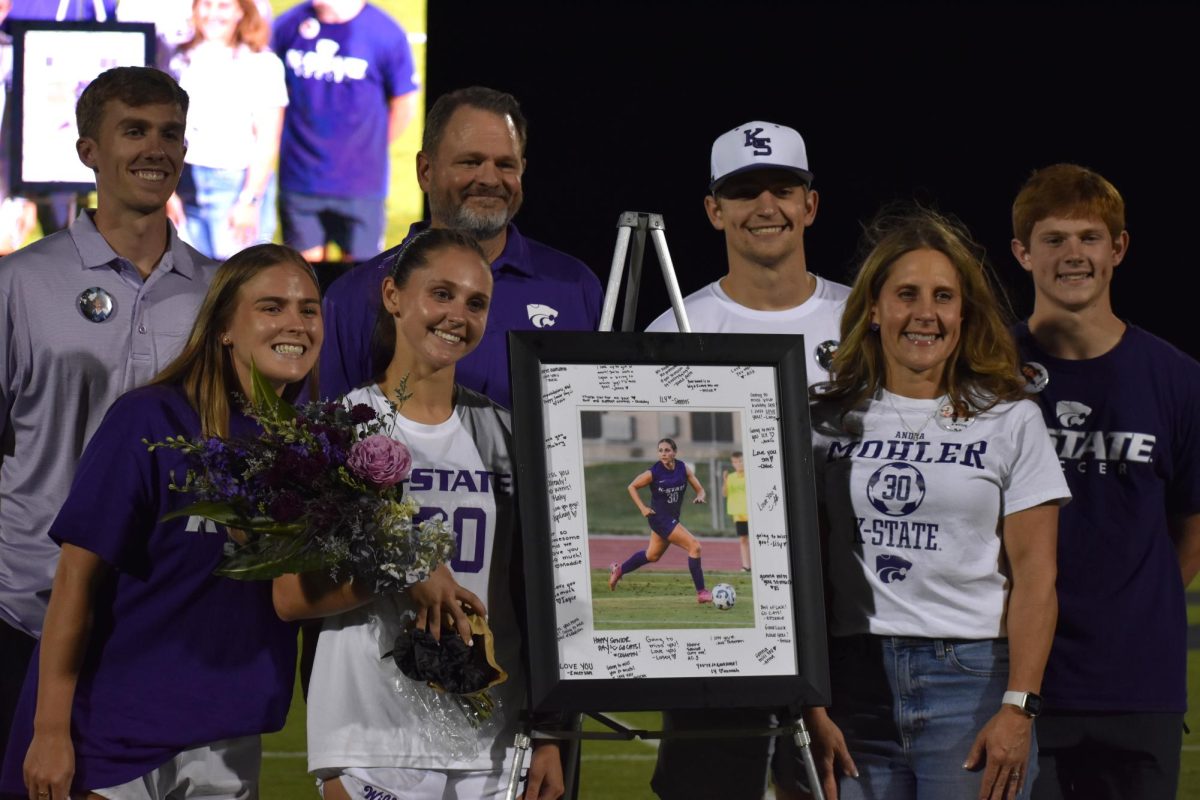 Andra Mohler and family celebrate Senior Night after the game against Colorado College on Thursday, Sept. 11. The Cats defeated the Tigers 3-1.