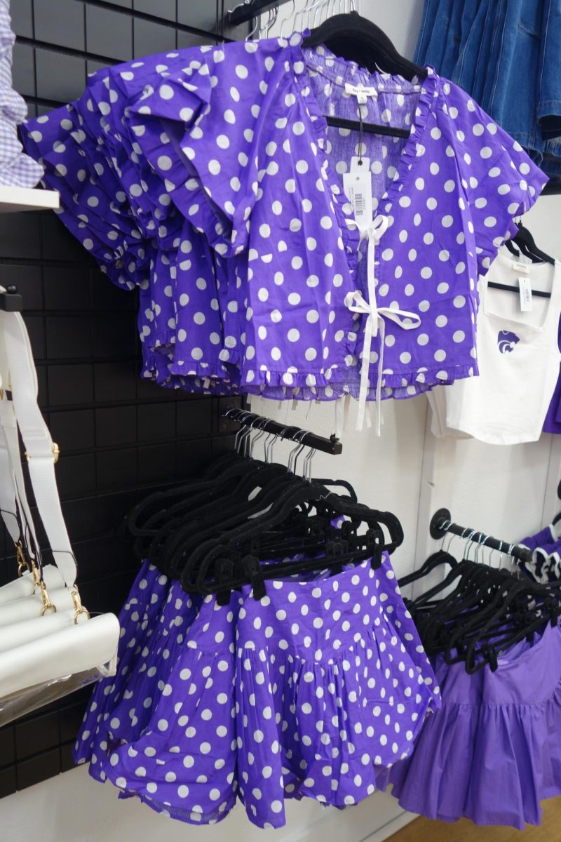 Mesa Collection Boutique is a women's boutique offering clothing, shoes, accessories, and small gift items located in Downtown Manhattan. The boutique is particularly known for their K-State themed attire. 