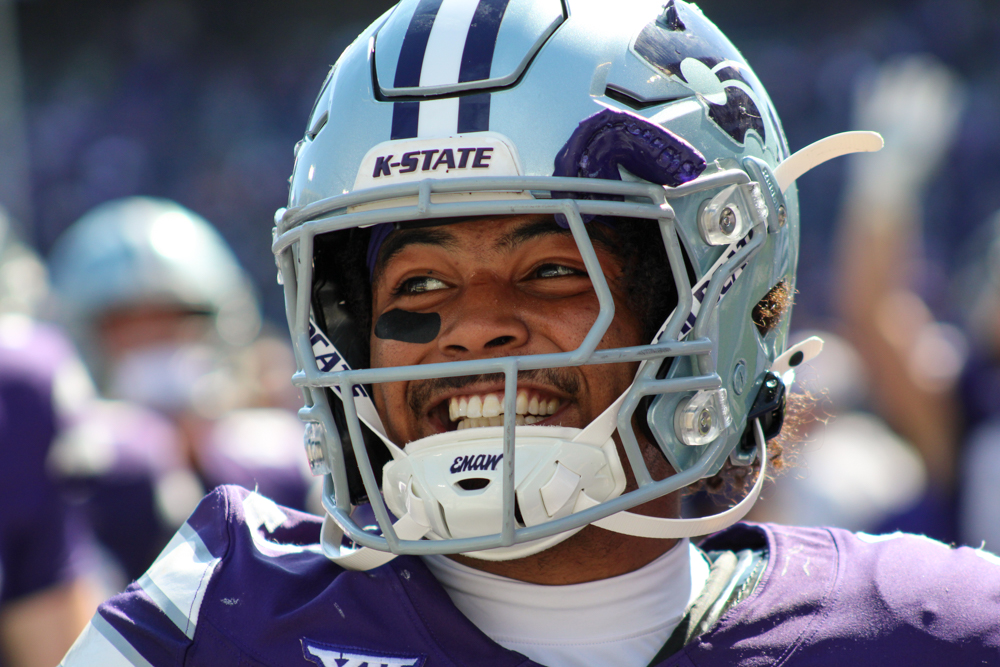 Dylan Edwards smiles broadly following K-State’s 34-20 victory over the UCF Knights on Sept. 27. 
