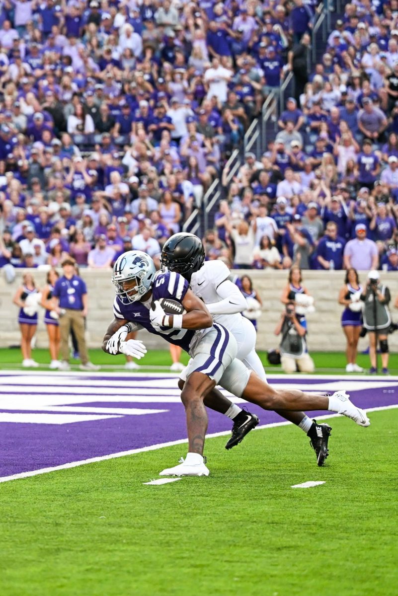 Jerand Bradley is tackled near the end zone by the Army defense. The play was further reviewed and did not result in a touchdown. 
