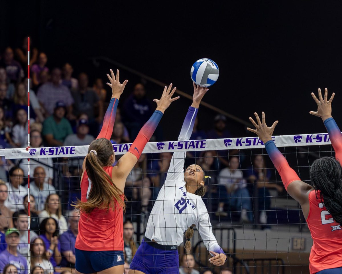Outside Jordyn Williams stretches to reach the ball and split Arizona's block. The Wildcats fell to Arizona 1-4 on Sept. 26
