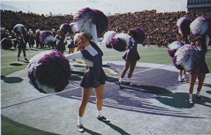 K-State cheerleaders perform at the 1974 Homecoming game. (Photo courtesy of the K-State Alumni Association)