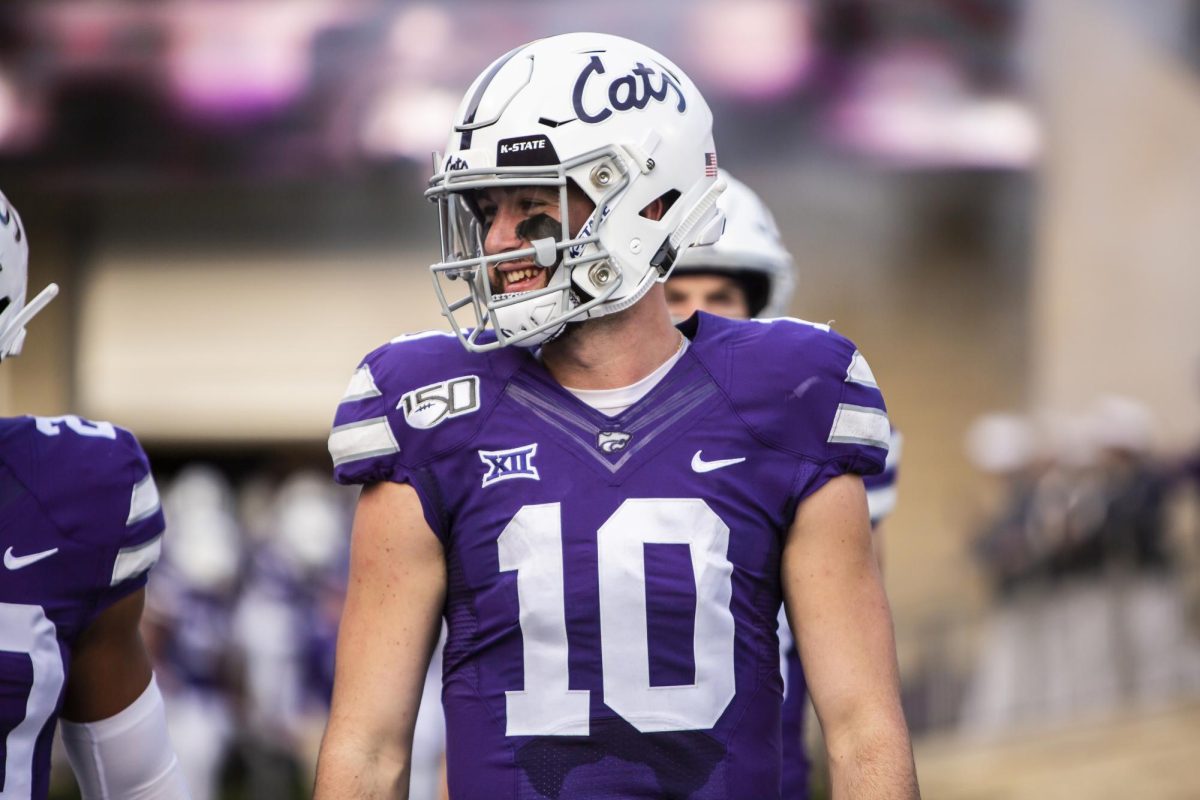 Junior quarterback Skylar Thompson walks out onto the field before K-State's football game against West Virginia at Bill Snyder Family Stadium on Nov. 16, 2019. The Wildcats lost to the Mountaineers with a final score of 24-20. (Archive photo by Logan Wassall | Collegian Media Group)