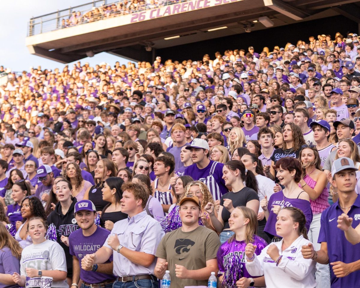 A sea of purple in the student section as they do the Wabash in the Bill. The Wildcats fell to the Army  21-24 at Bill Snyder Family Stadium of Sept. 6.