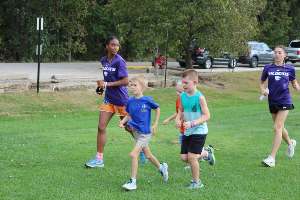 A slight jog around the Anneberg field for the Cross Country and Track & Field K-State student athletes and kids in the Run Your City MHK on Oct. 5th.