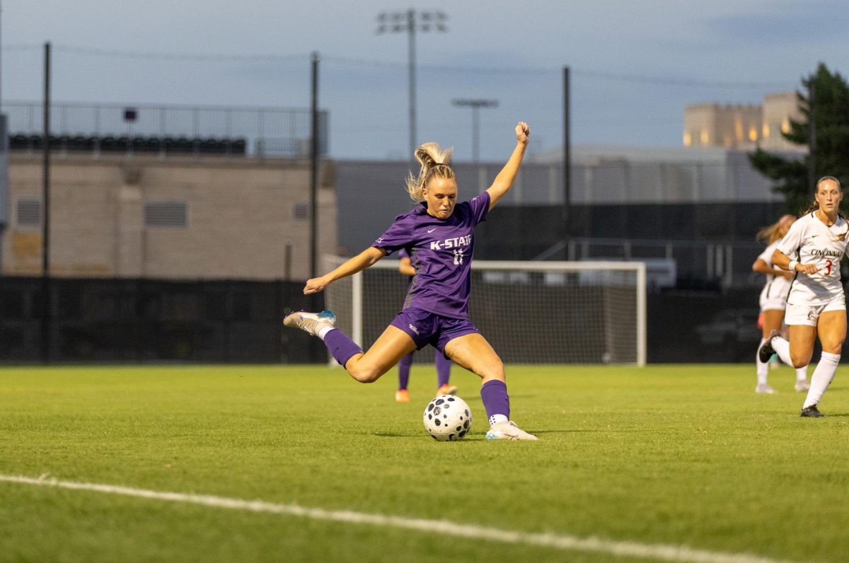 Emerson DeLuca prepares to pass the ball to a teammate. The Wildcats defeated Cincinnati 2-0 on Oct. 16 at Buser Family Park. (Haylee Haslett _ Collegian Media Group)