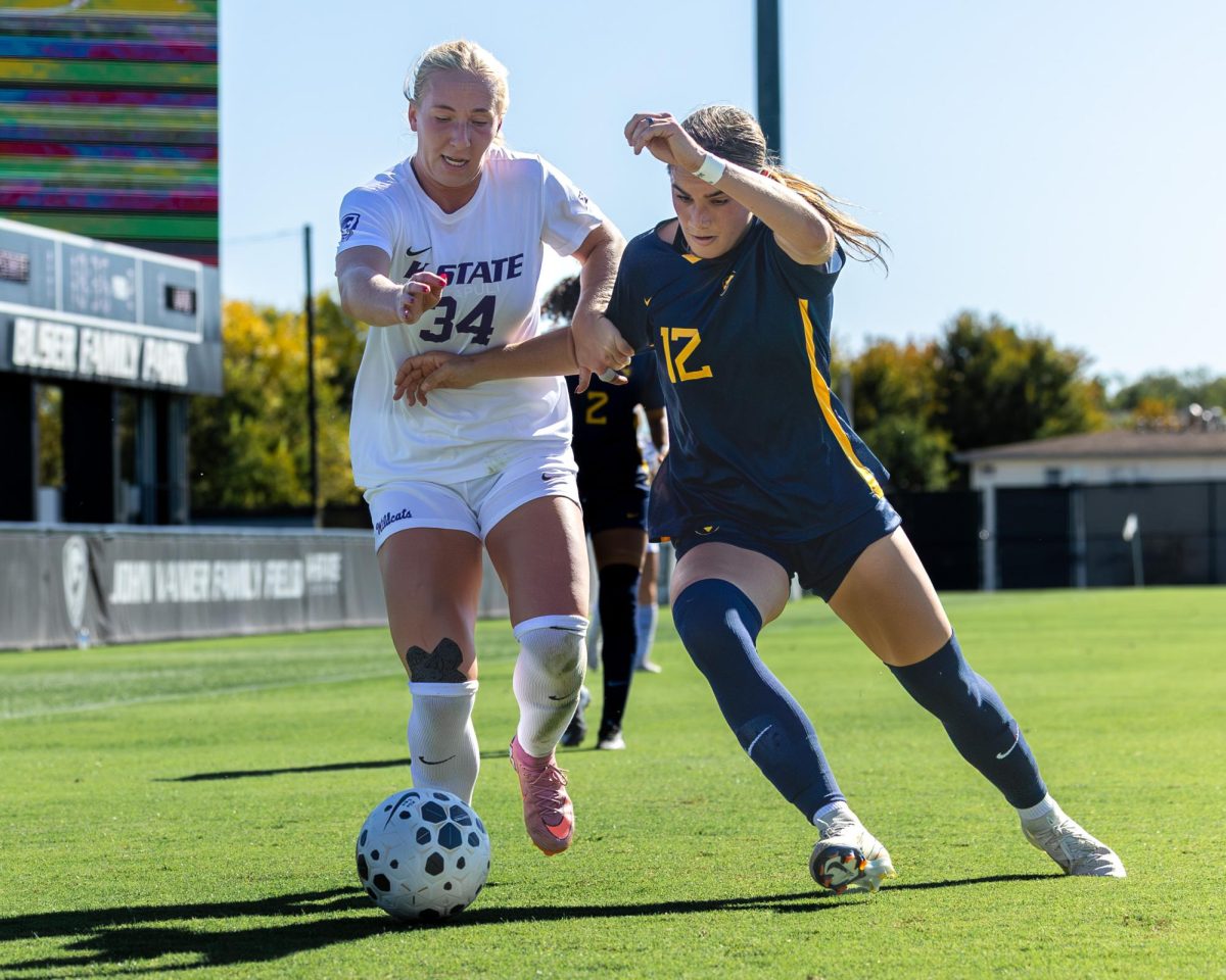 Forward Allison Marshall (34) working to score a goal in the second half against West Virginia on Oct. 19, 2025. The Wildcats fell 2-3 in a hard fought battle.