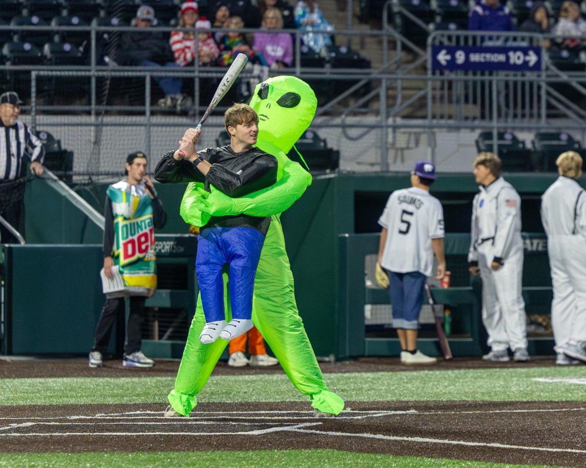 Max Bettis as an inflatable alien as he bats in the ALS Baseball Game on October. 27, 2025.