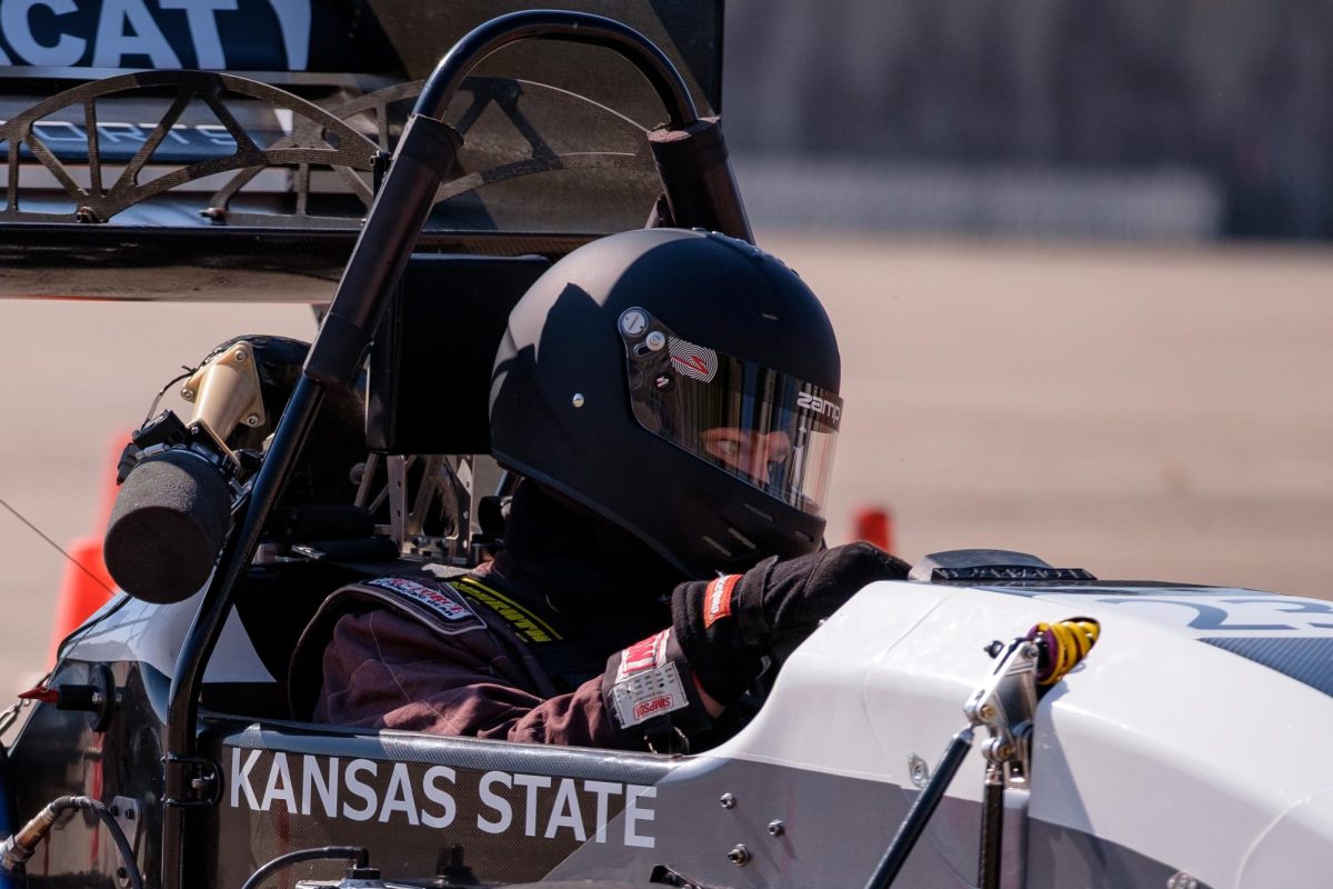 Kansas State Electrical Engineering student, Alayna Dill, focuses on the track as she drives the 2024 car, Leopard, during the skidpad event at the Formula Wheat Invitational on October 4, 2025. Dill, the Business Lead for Powercat Motorsports, was on the organizing committee for the event. 