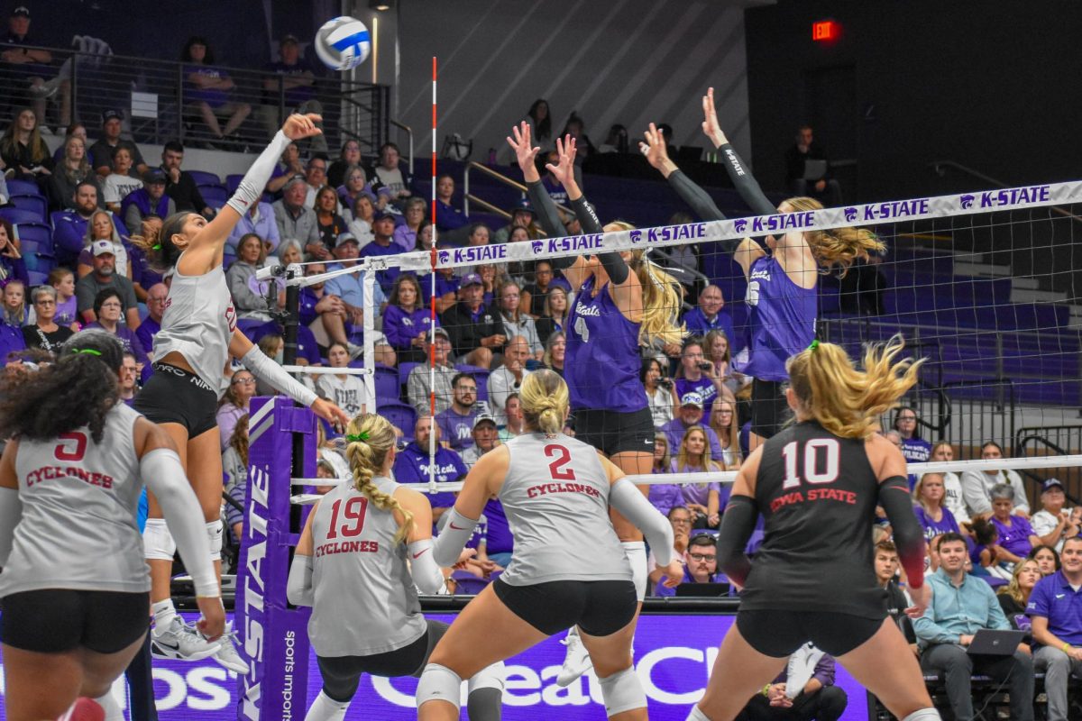 Sophomore Reagan Fox and freshman Cadence Lundgren jumped up for the block. Iowa State defeated the Wildcats in match 5 at Morgan Family Arena on Oct. 8.
