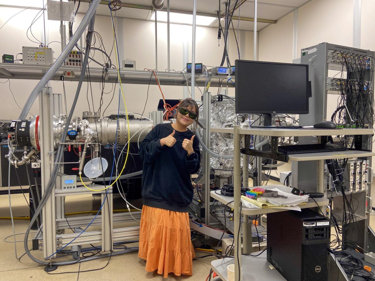 While at the lab, Tu Nguyen works with a Cold Target Recoil Ion Momentum Spectrometer, a space imaging technique.