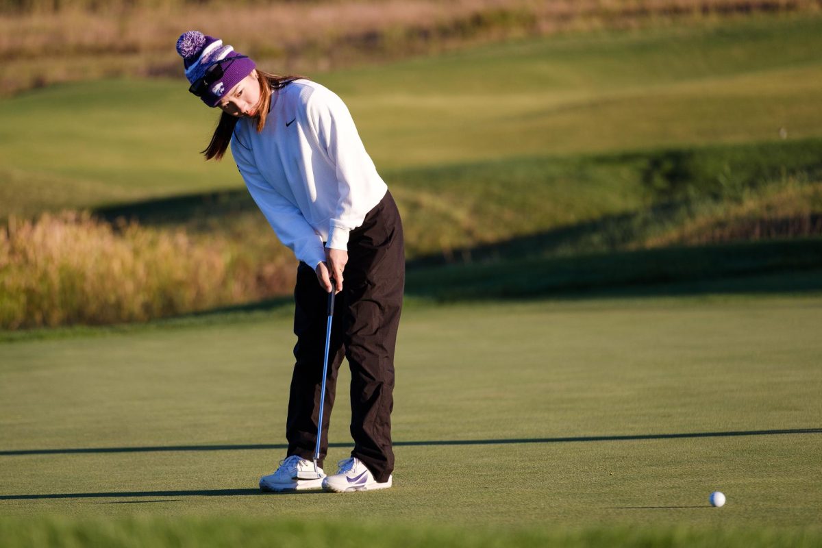 K-State Golfer Nanami Nakashima watches her putt at the Powercat Invitational on October 20, 2025. Nakashima finished three under par after the first day of the event.
