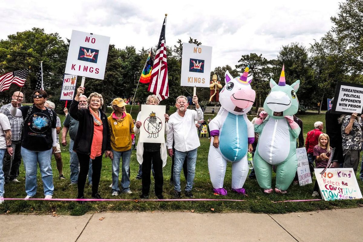 Some protestors dressed in inflatable costumes, inspired by viral protest videos in Portland, Ore. Costumes included unicorns, dinosaurs and Uncle Sam. (Photo courtesy of Tom Leopold) 