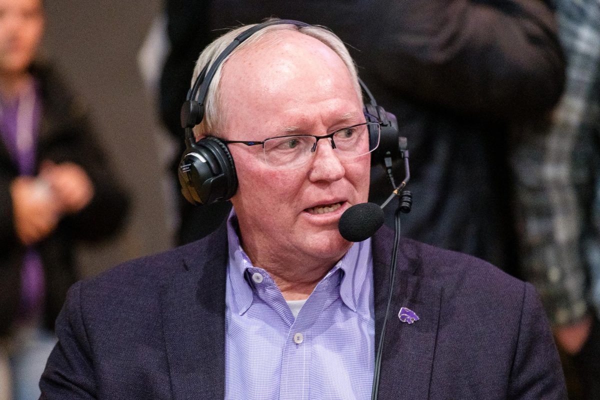 K-State Athletic Director, Gene Taylor, talks over the radio following the welcoming ceremony for Collin Klein on December 5, 2025 at Morgan Family Arena.
