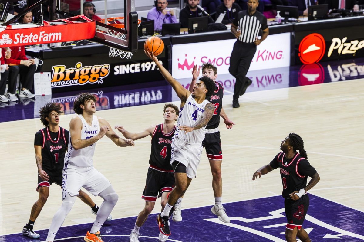 P.J. Haggerty (4) goes up for a layup in the first half against South Dakota on Saturday, Dec. 20 in Bramlage Coliseum. Haggerty finished with 24 points in a 106-76 victory. 