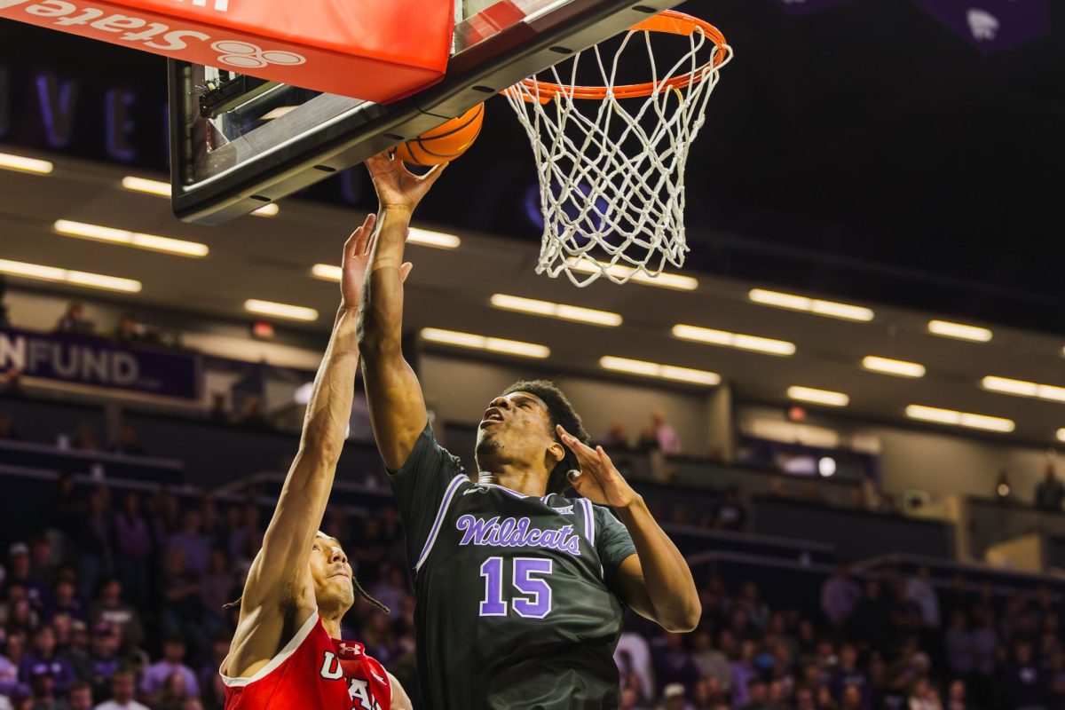 Taj Manning (15) jumps for a layup during the second half in the match against Utah. The Cats' won 81-78 against the Utah on Jan. 20, 2026. 