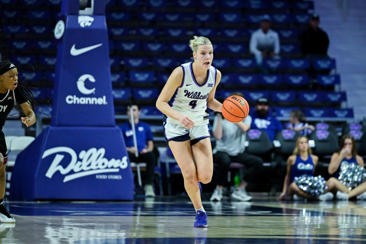 Junior Nastja Claessens travels down the court during the first half of the Nov. 18 game against Troy. Claessens gained a total of nine points and two rebounds against the Trojans. 