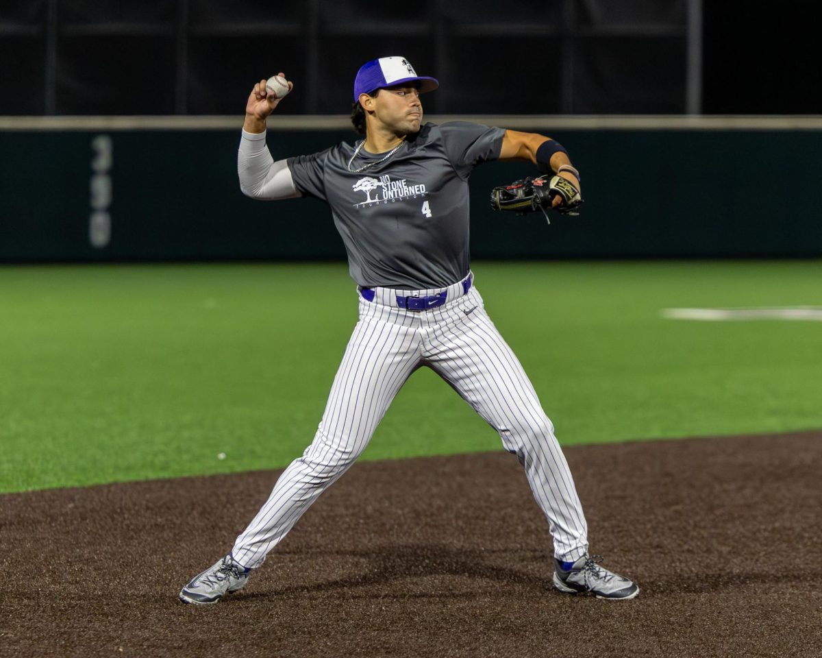 K-State infielder Carlos Vasquez throws to first base after fielding a ground ball during game two of the Fall World Series on Friday, Nov. 7, 2025.