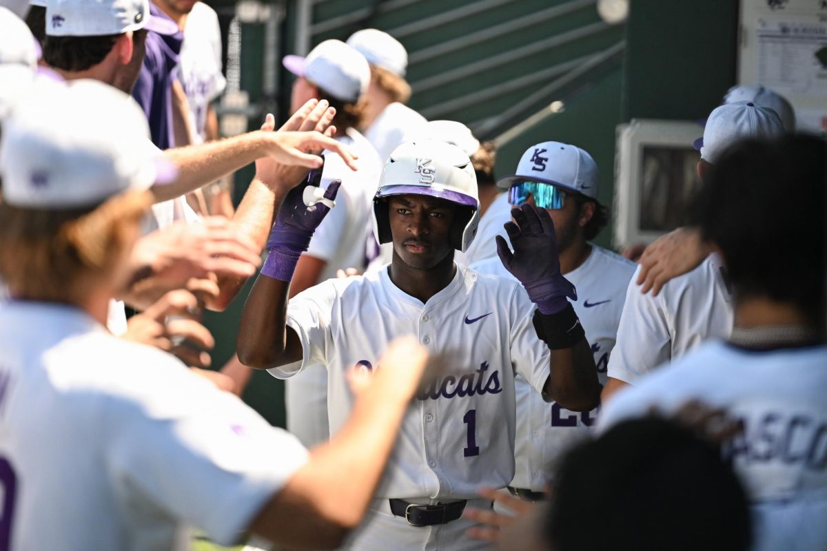 Dee Kennedy returns to the dugout after scoring 1 out of 14 runs against West Virginia on May 5, 2025.  