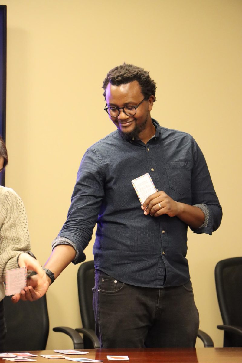 At a speaking event at the Staley School of Leadership on Feb. 25, 2026, one of the facilitators helps a student understand the next steps.