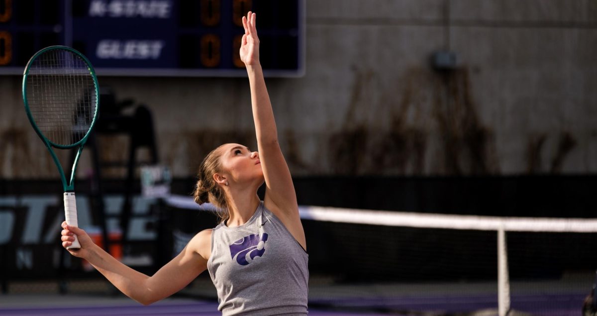 K-State Tennis player Diana Smolinska lines up with her serve as she competes in a doubles match against Wichita State on Feb. 13, 2026 at the Mike Goss Tennis Stadium. 