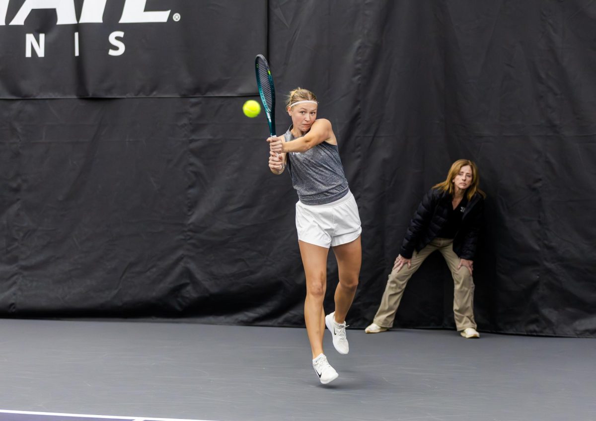 Varvara Bernovich focuses on the ball as she serves. The Wildcats fell to #25 TCU 2-4 on March 23 at Peakform Sports & Wellness Center. 