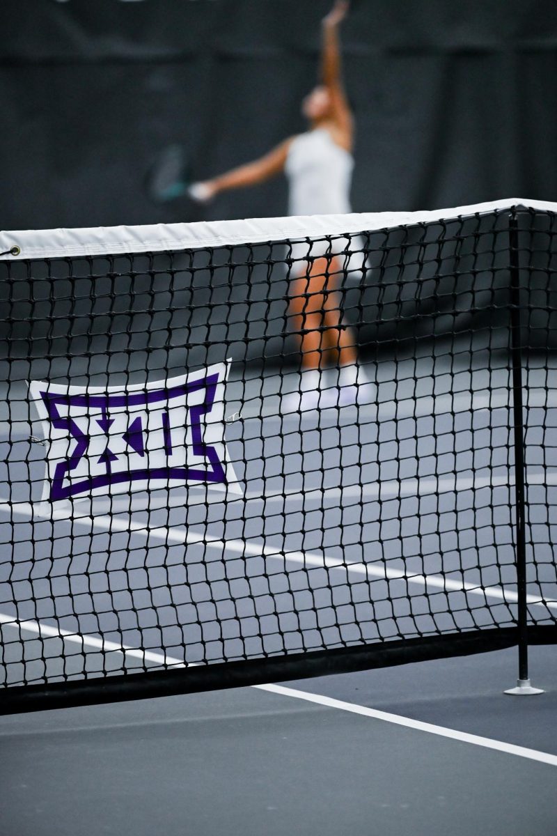 Junior Maralgoo Chogsomjav prepares to serve the ball during the first conference match against West Virginia on March 1. K-State took down the Mountaineers in a 4-1 win.