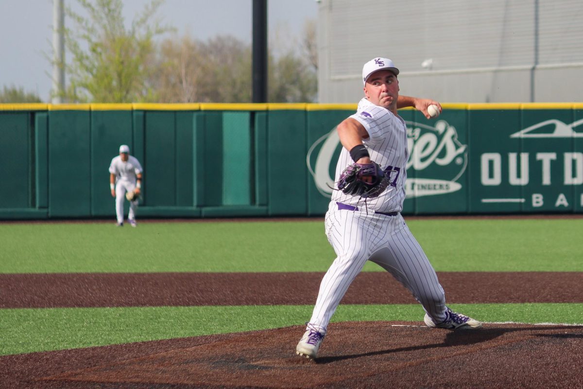 Lincoln Sheffield pitches to an opposing Oklahoma State player. K-State defeated the Cowboys on April 11, 2026, at Tointon Family Stadium.