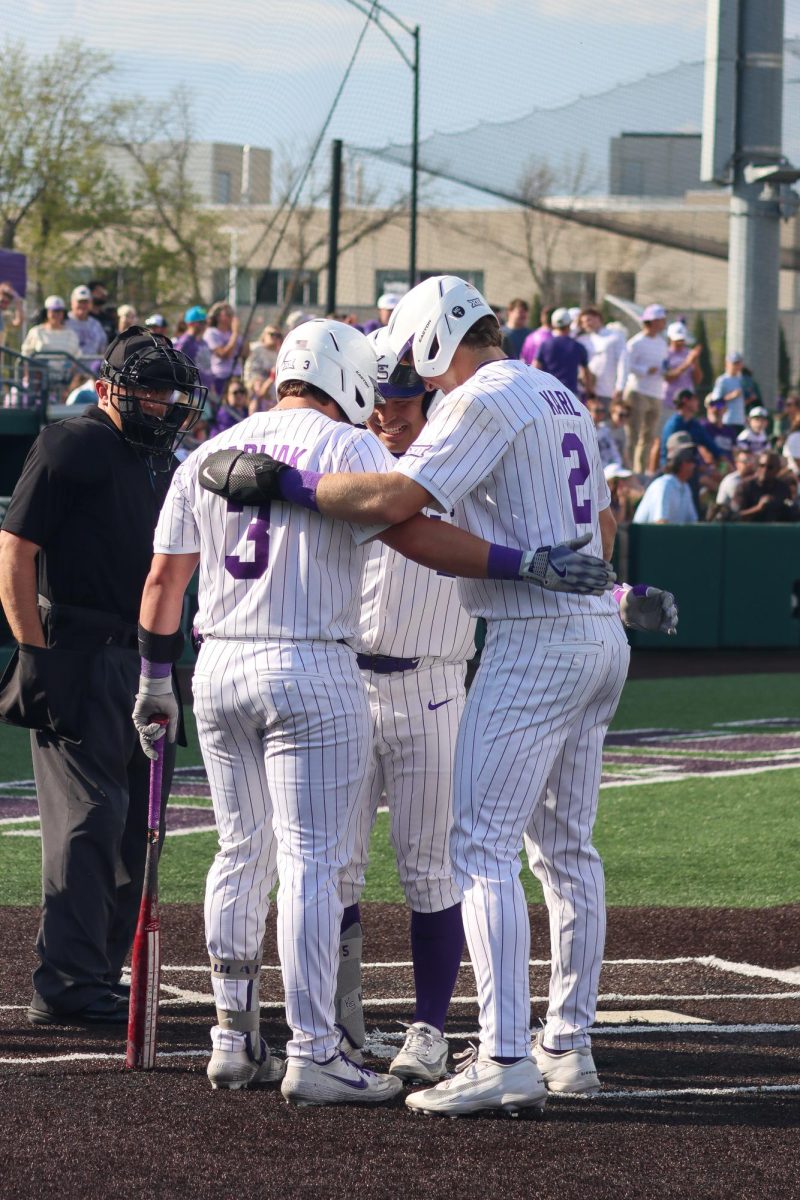 Bear Madliak and Cadyn Karl celebrate Shintaro Inoue's home run with him during the April 11 game against Oklahoma State. The 'Cats defeated the Cowboys, 13-9, in Tointon Family Stadium. 
