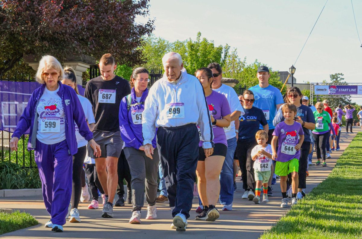 Bill Snyder heads the alternative Run for the Roses option, the walking 1-kilometer. The non-competitive event allowed participants to walk a stretch of the course at their own leisure.
