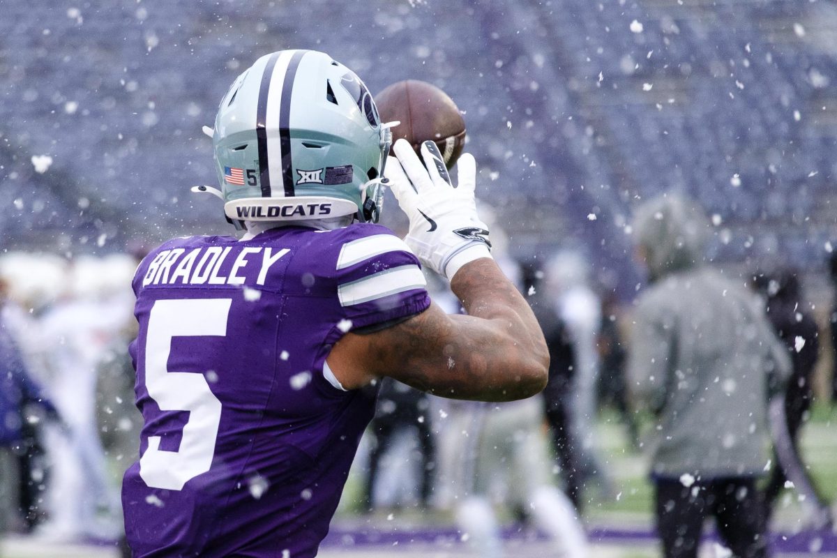 Wide receiver Jerand Bradley reels in a catch during warmups for the November 29, 2025 game against Colorado at Bill Snyder Family Stadium. 