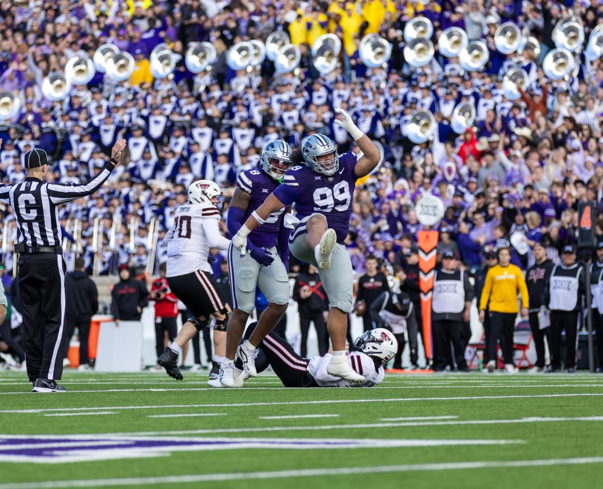 Uso Seumalo (99) celebrates a successful sack against Texas Tech. The Wildcats fell to Texas Tech 20-43 on Nov. 1, 2025 at Bill Snyder Family Stadium. 
