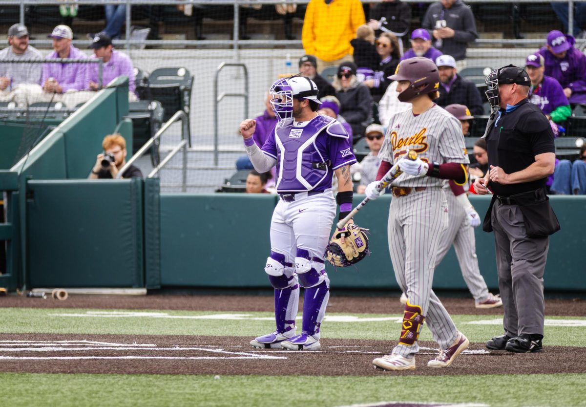 Bear Madliak celebrates a successful pick at second base for an out. Madliak had one hit and one run in the game. The Wilcats defeated Arizona State 12-1 on March 22 at Tointon Family Stadium. 
