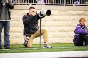 Chandler Mixon takes photos at a K-State Football game in Bill Snyder Family Stadium. (Photo courtesy of Chandler Mixon)