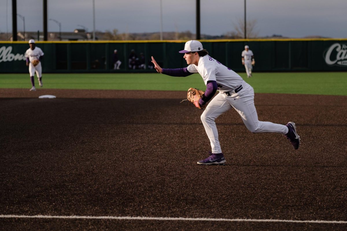 KYO First baseman Ty Smolinski (34) calls off assistance as he runs in to force a ground out against TCU on April 3 at Tointon Family Stadium. 