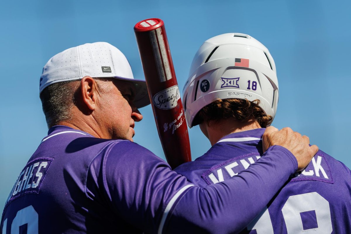 Head Coach Pete Hughes talks to designated hitter Micah Kendrick (18) prior to battiing in the matchup against TCU on Sunday, April 5. 