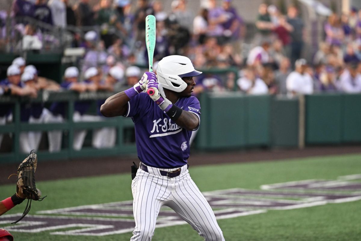 Junior infielder Dee Kennedy waits for the Nebraska pitch during the Tuesday evening game on March 24. The 'Cats fell to the Cornhuskers 14-9.