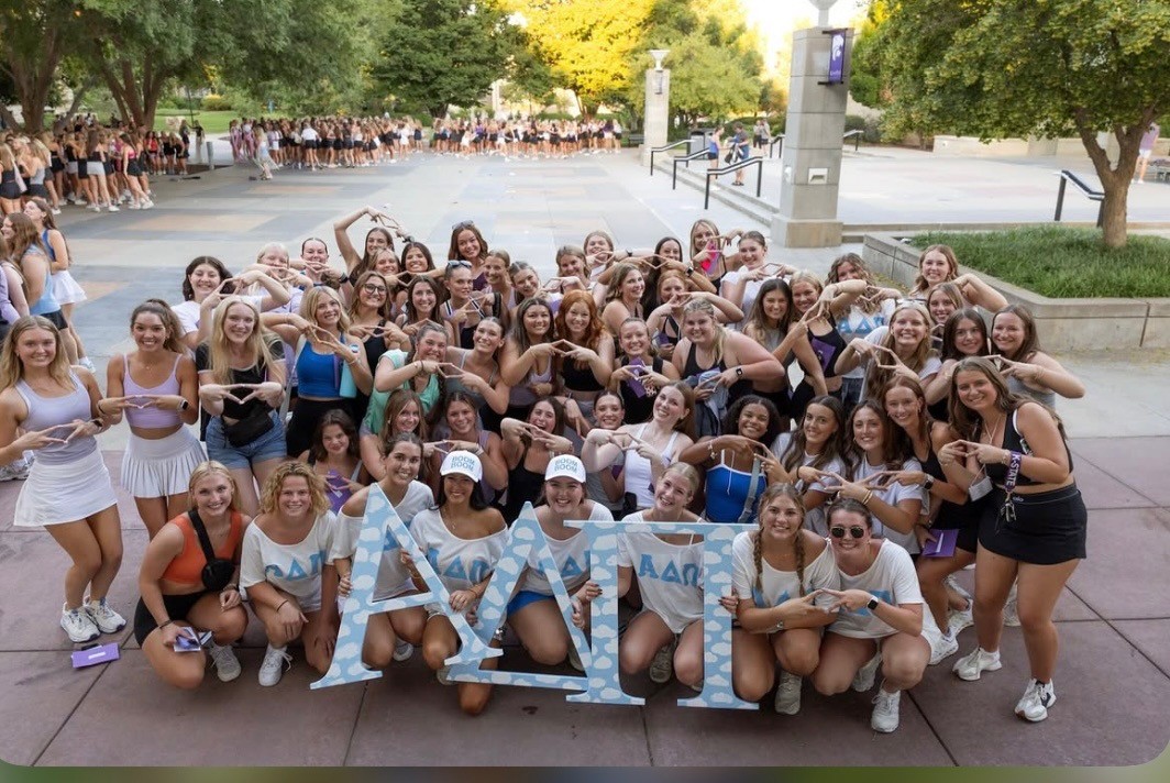 New Alpha Delta Pi members at K-State pose with new members from Fall 2025 Bid Day.