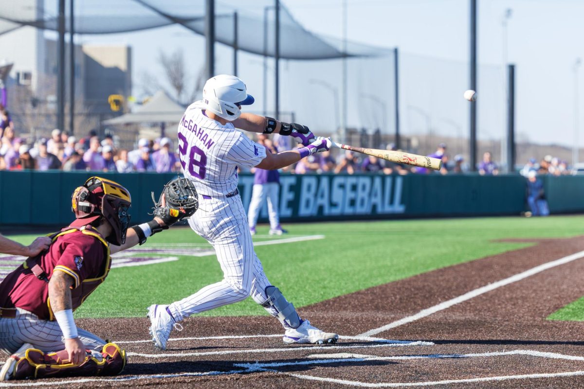 Shea McGahan (28) hits a solo home run during Kansas State’s matchup against Arizona State on March 21. 
