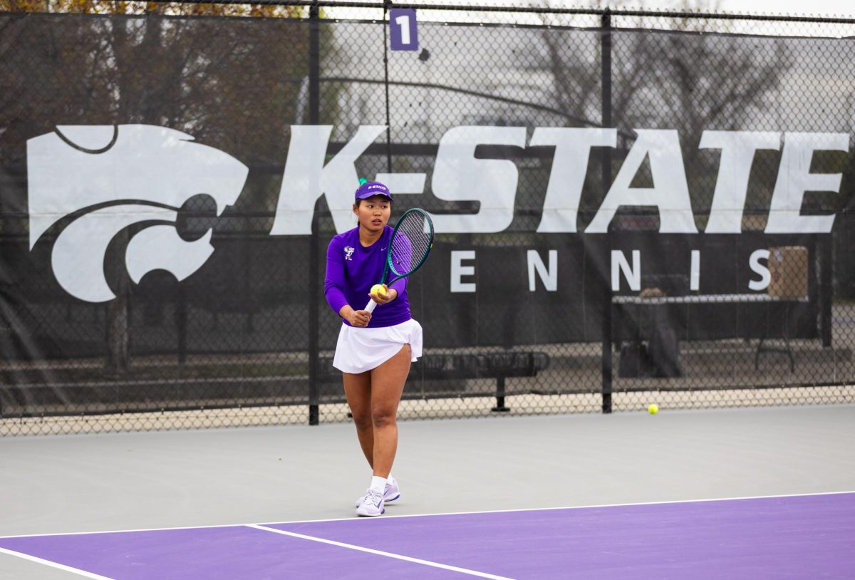 Maralgoo Chogsomjav prepares to serve during her doubles match against Iowa State on April 10 at Mike Goss Tennis Stadium.