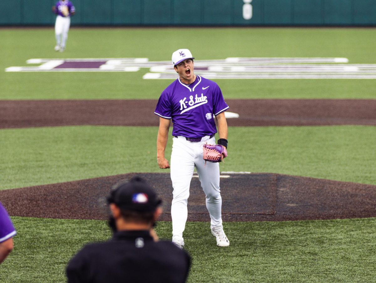 James Guyette yells with excitement as he strikes a batter out to end the game. The Wildcats defeated UCF 8-6 on April 13 at Tointon Family Stadium. 