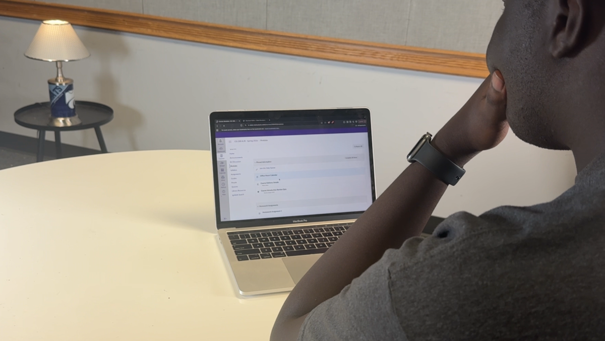 A student scrolls through Canvas by Instructure, K-State's Learning Management System. Canvas is used by over 40% of higher education institutions in the United States.