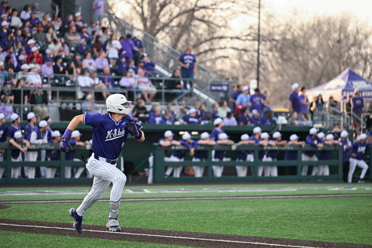 Sophomore infielder Ty Smolinski sprints to first base after a hit against Nebraska on March 24.