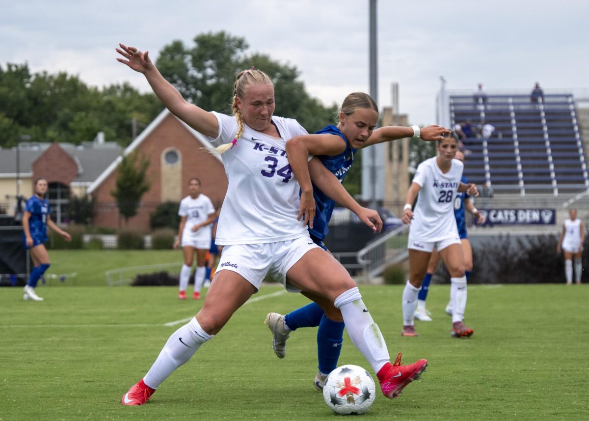 Forward Allison Marshall fights for possession in the first half of K-State’s 2-0 win over South Dakota State on Aug. 23, at Buser Family Park.
