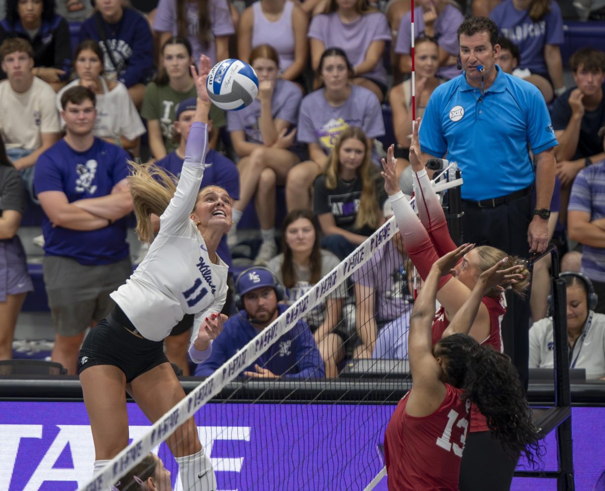 K-State’s Skylar Brady (11) pounds the ball during the Wildcats’ 3-0 exhibition win over Oklahoma on Aug. 22.