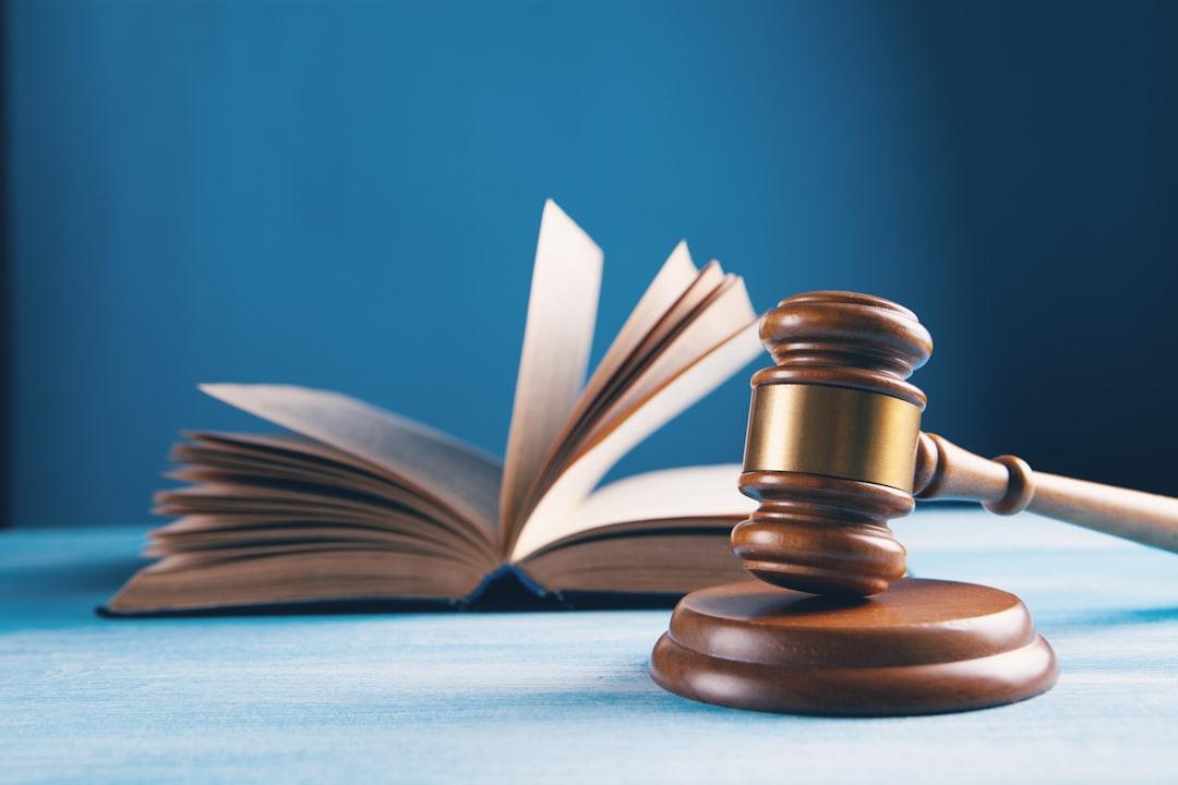 A government regulation document and gavel on a desk