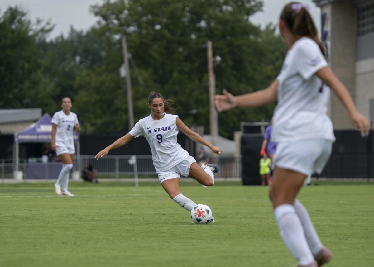 Lauren Moylan (9) goes to fake a shot before passing the ball.In the Cats win 2-0 win over South Dakota State Moylan had 1 assist on Aug. 23, at Buser Family Park.
